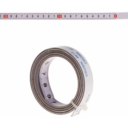 Selvklæbende målebånd fra venstre mod højre, højre mod venstre, i midten af begge sider