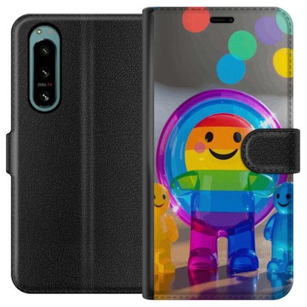 Yhteensopiva Lompakkokotelo Sony Xperia 5 IV Pastellivärinen yksisarvinen, jolla on sateenkaaren harja ja suuret silmät taianomaisessa talviympäris