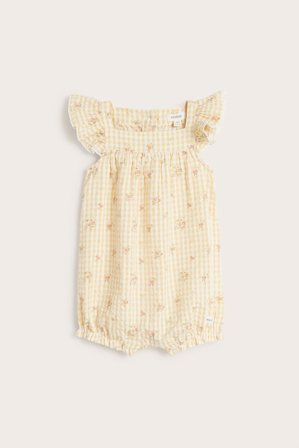 Newbie | Blomstrete playsuit med blondekant | Gul