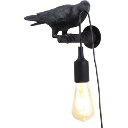 Svart vegglampe i resin med fuglemotiv