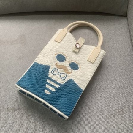 Stickad handväska Knot handledsväska 1 1