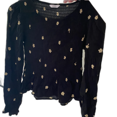 Somrig topp med gula blommor