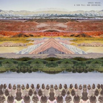 A sun full and drowning GRASS HOUSE