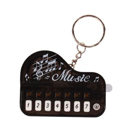 Elektronisk tastatur nøkkelring i lommestørrelse Mini musikkleketøy med flere lydeffekter Perfekt for musikkentusiaster gave