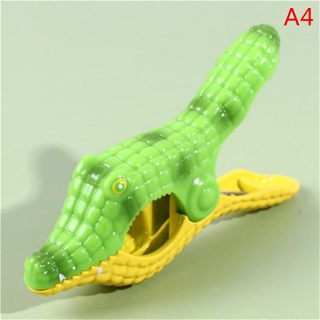 Strandhandduksklämmor i plast för solstolar med djurdekoration