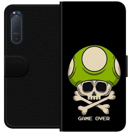 Yhteensopiva Lompakkokotelo Sony Sony Xperia 5 II Pelimotiivi, jossa on kuolonsyöjä ja vihreä sieni retro pelityylillä ja tekstillä game over
