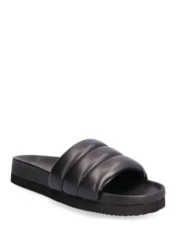 Tuka Black RE:DESIGNED EST 2003