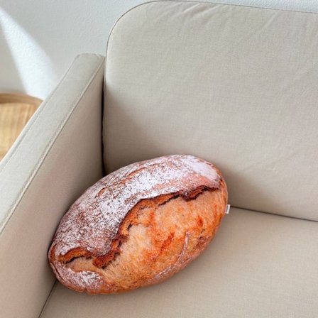 Kudde i form av en brödlimpa