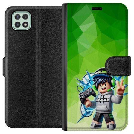 Kompatibelt Lommeboketui til Samsung Galaxy A22 5G Roblox-inspirert gamerfigur med headset, håndkontroll og energiske effekter mot grønn bakgrunn