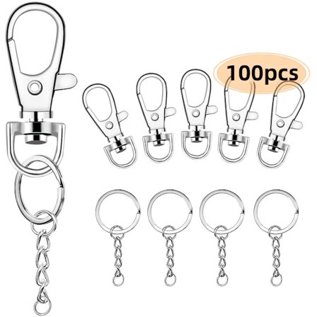 100 kpl (50 hopeista koiranlukkoa + 50 avaimenperää) seosmetallisia kääntöjä