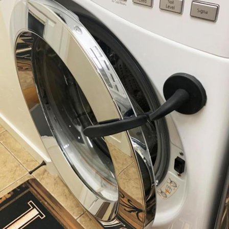 Pyykinpesukoneen luukun pidike – Magneettinen joustava pesukoneen ja kuivausrummun luukun tuki