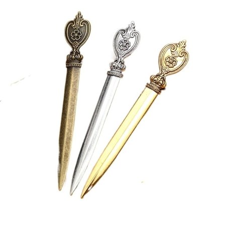 Vintage kirjeenavaaja kirjekuorenavaaja