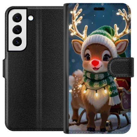 Kompatibelt Plånboksfodral till Samsung Samsung Galaxy S22 5G Julig ren med lysande horn, röd nos och stickad grön mössa står framför släde i s