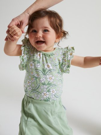 Kurzärmliger Body mit Rüsche weiß geblümt - 56 - kinderbekleidung - green - Polarn O. Pyret