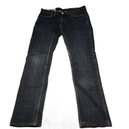 Mörk blåa Acne jeans.