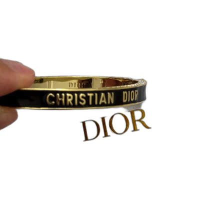 Svart och guld armband med strass