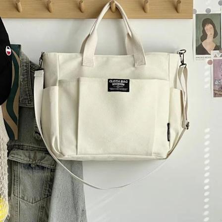 Urban Minimalist Kvinnlig Student Stor Kapacitet Pendla Horisontell Canvas Enkel Axel Diagonal Cross Portable Tote Bage Off white