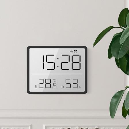 Pieni LCD-näyttö Elektroninen digitaalinen kello voidaan ripustaa seinälle taakse magneetti-imulla Voidaan ripustaa jääkaappiin, lämpötila- ja 