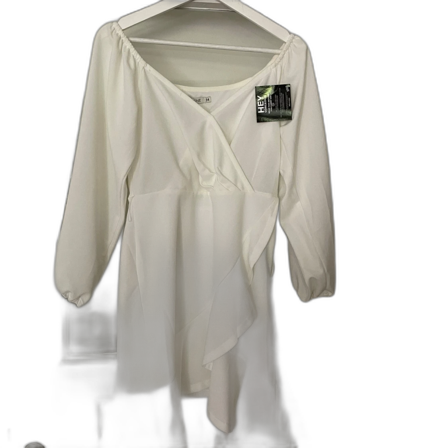 Vit omlottklänning med volang