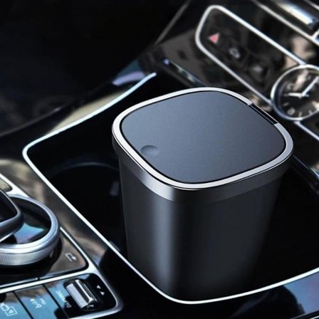 Musta auton roskakori kannella, pieni kuppiteline, ovipussi, roskakori autoon, kotiin, toimistoon