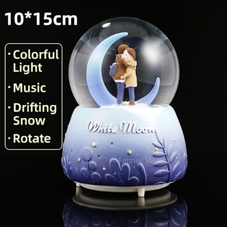 Lumipallo-soittorasia kelluvilla sinisillä ja violetilla valoilla jouluksi [ZHE]