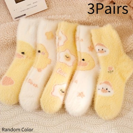 Yndige og hyggelige fluffy gulvsokker med tegneserieænder, perfekte til efterår og vinter, inklusive damevarianter.