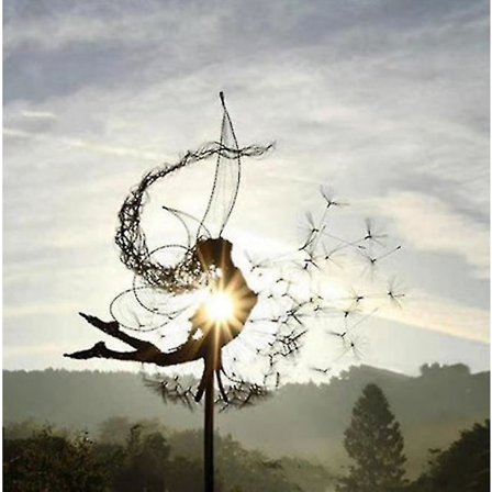 Tanssiva keiju voikukkapatsas koristeena panokset