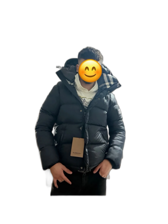 Svart pufferjacka i nyskick – storlek M