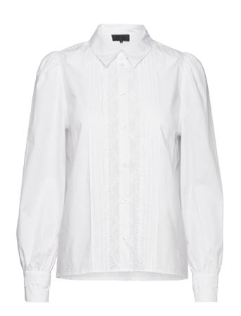 Lr-Bradie White Levete Room