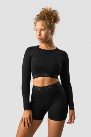 ICANIWILL - Define Seamless Logo Long Sleeve Crop Top Black - Träningströja - Dam - Träningskläder från ICIW