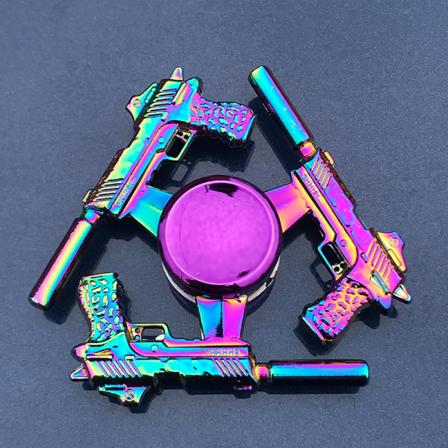 Metallisk fargerik legering fingertoppgyro Fingerrotasjon Finger Nyttig verktøy for stressreduksjon Colorful Pistol 140