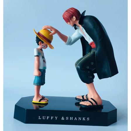 Piratsidedrengen slår Luffys hoved ved at ramme den klassiske terrænmodel (Shanks hits Luffys hovedtaske (350g)