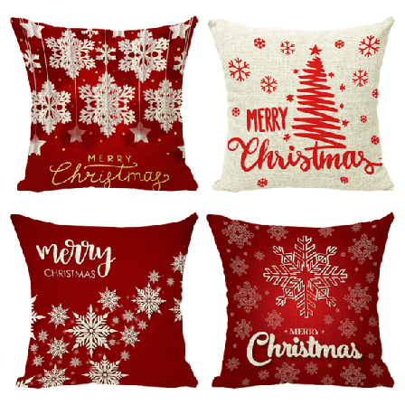 IC-setti, jossa 4 jouluaiheista lumihiutaleilla koristeltua tyynyliinaa