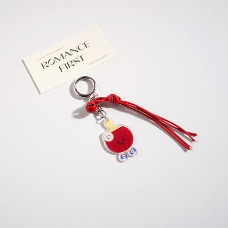 Sarjakuva Q-versio avaimenperiä, urheiluvälineiden avaimenperiä, punainen