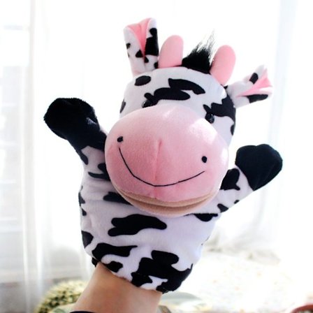 Ku hånddukke - en plysjleke egnet for barn fra 2 år og oppover.