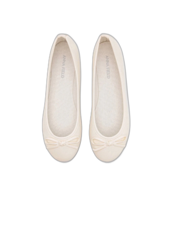 Beige ballerinaskor med rosett