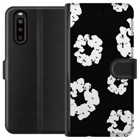 Sony Xperia 10 II Lompakkokotelo Contemporary Tears - ilmeesi denim-tuntumalla ja kukkakuvioilla, jotka luovat modernin, ylellisen ja trendikkään ka
