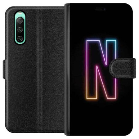 Yhteensopiva Lompakkokotelo Sony Sony Xperia 10 IV Minimalistinen neonkirjain N värinvaihtuvassa valossa mustaa taustaa vasten