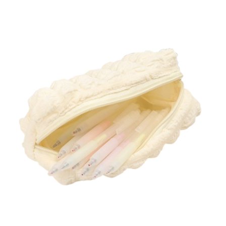 Penalhus i cremesnitte-design