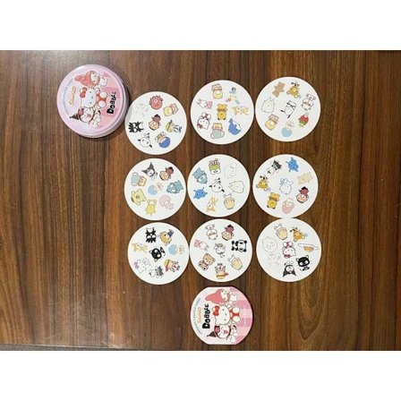 Englanninkieliset korttipeli "Spot the Difference" - vanhemman ja lapsen juhlapeli