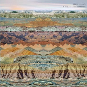 A sun full and drowning GRASS HOUSE