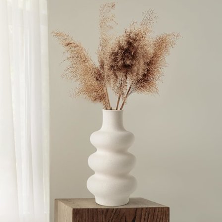 Beige vase laget av keramisk blomster vase moderne med donut design