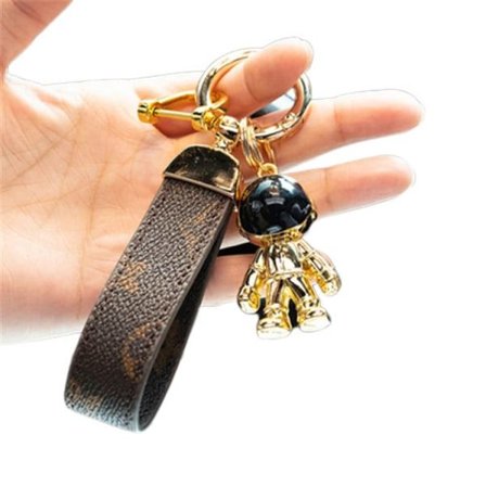 Klassisk blomst læder nøglering guld + guld Spaceman kreativ astronaut nøglering enkel personlighed rummand vedhæng bil nøglering ring IC