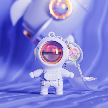 Söpö astronauttiavainperä avaruusavainperä auringonlaskun valolla, viileä ulkoavaruuden avaimenperä riipus auton avaimenperä lompakko lahja violetti 