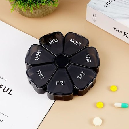 1 stk. sort BPA-fri premium kvalitet farverig kronbladformet pilleæske