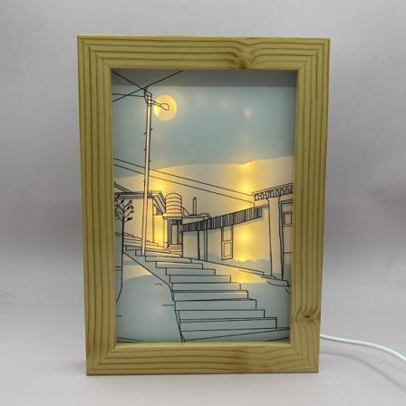 Luova valokuvakehysvalaisin roikkuu maalaus makuuhuoneen sängyn koristeena tausta yövalo White