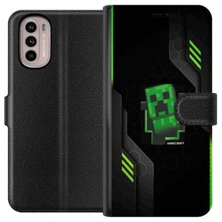 Yhteensopiva Lompakkokotelo Motorola Motorola Moto G31 Vihreä pikselipohjainen peli-esitys, jossa on futuristisia neon-elementtejä ja tumma tech-tau