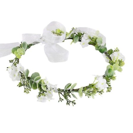 Hvit blomst grønt blad