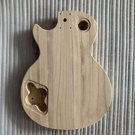 Viimeistelemätön käsintehty kitaran runko Intialaista öljypähkinäpuuta Sähkökitaran runko Kitaran rungon vaihto-osa