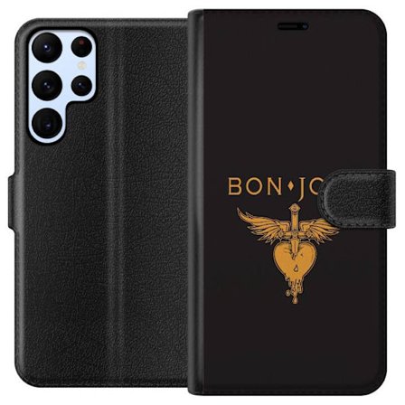 Kompatibelt Plånboksfodral till Samsung Galaxy S24 Ultra Ikonisk musikillustration med bevingat hjärta och dolk i guldtoner på mörk bakgrund, kraf